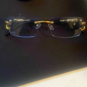 Versace shades that my friend gave me just trying to get them off of me.